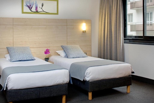 Hotel con habitación compartida